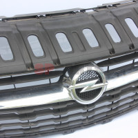 Corsa E Grill in bumper voor 39003576